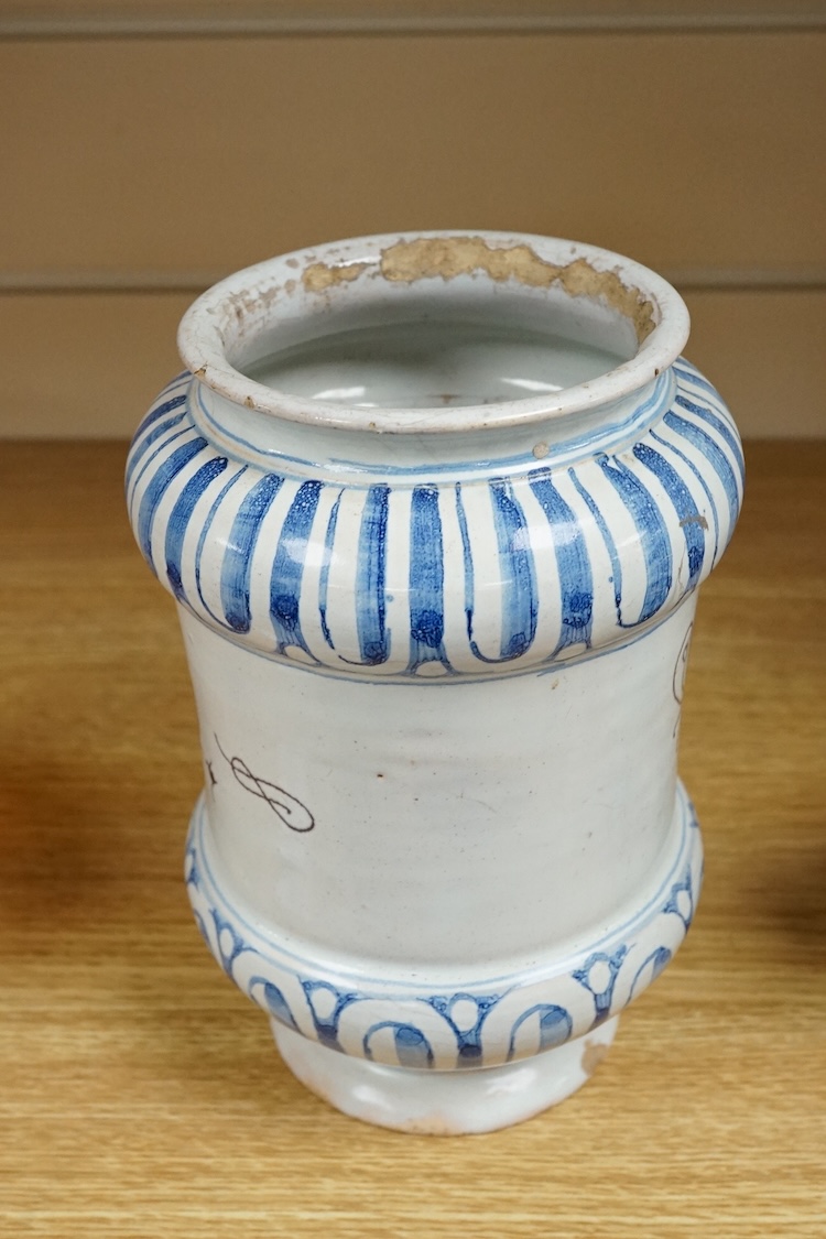 An 18th century Savona maiolica Albarello, inscribed in Manganese; ‘V. litragirio’ (lead oxide), 19cm high